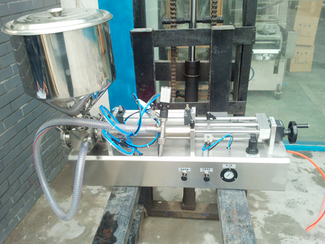 машина за полнење течен вискозитет со сос за храна со преносни рачни млазници2